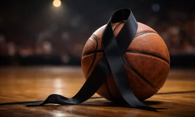 pallone di basket con una coccarda nera