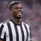 Pogba sorridente con la maglia della Juventus